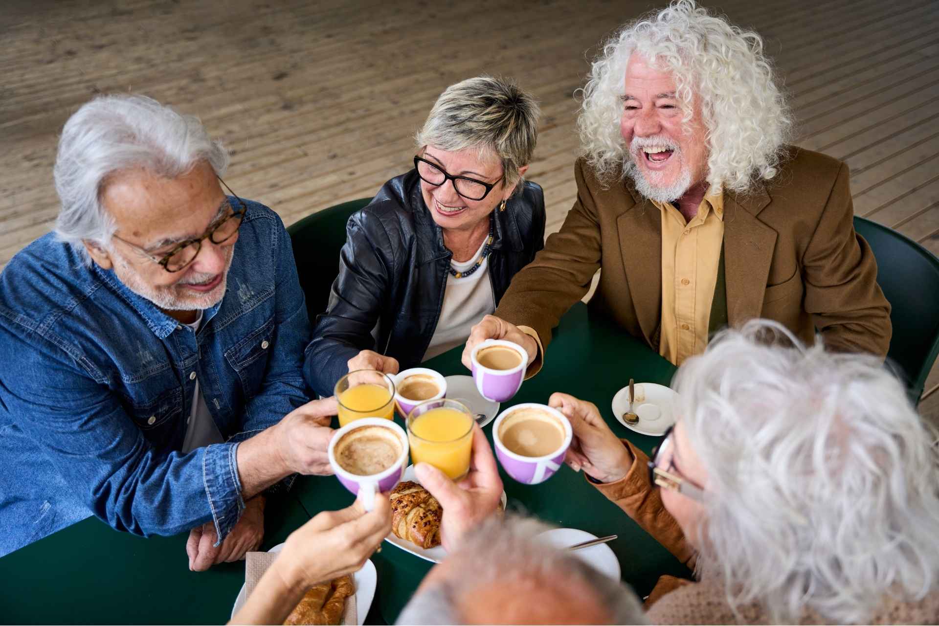 Seniors enjoying coffee and tea together